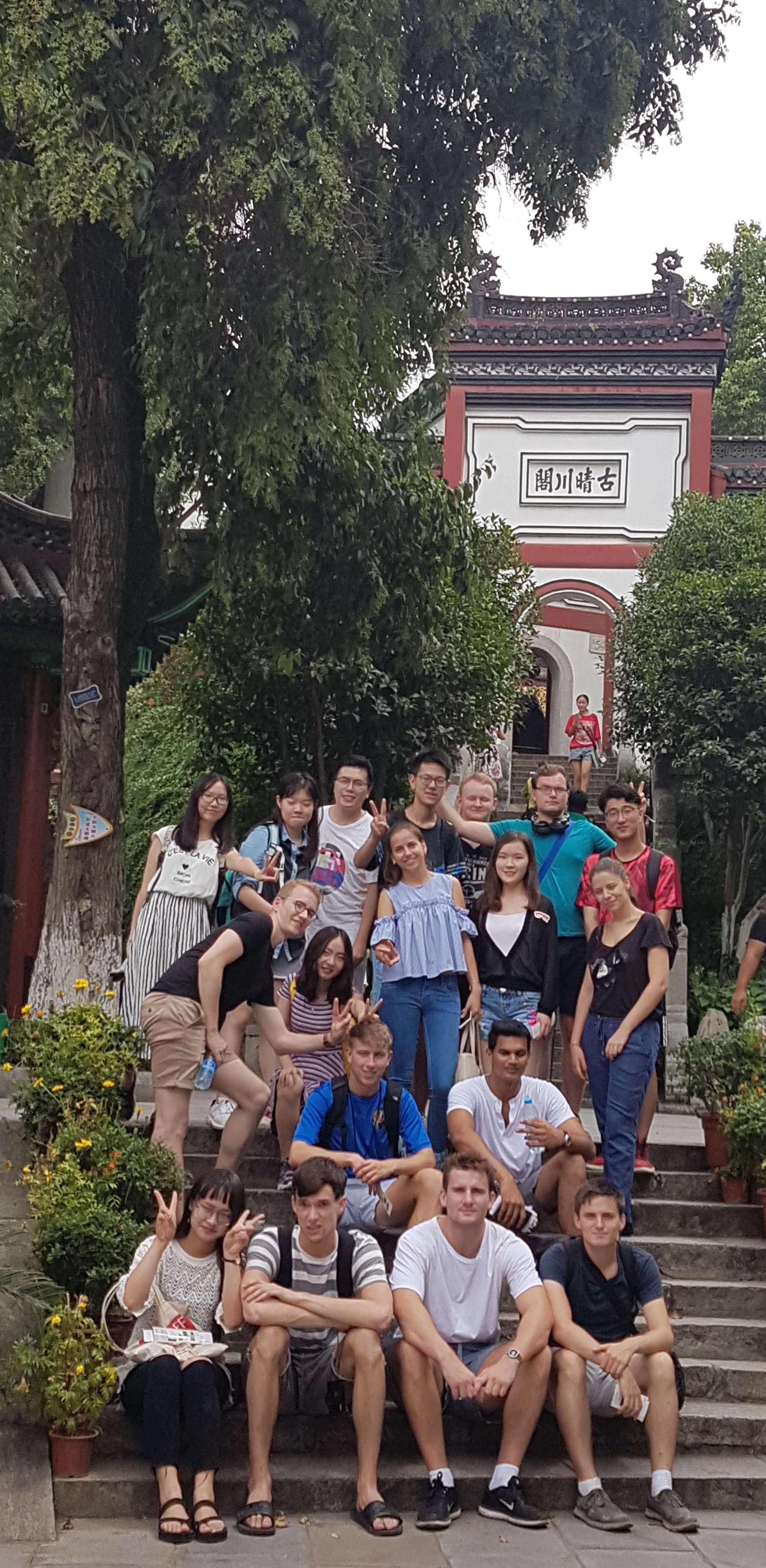 Students outside Chinese temple